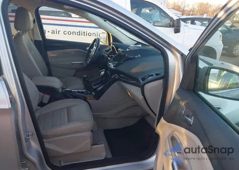 2014 Ford Escape Titanium z USA, uszkodzony, nr VIN 1FMCU9J9XEUC10703